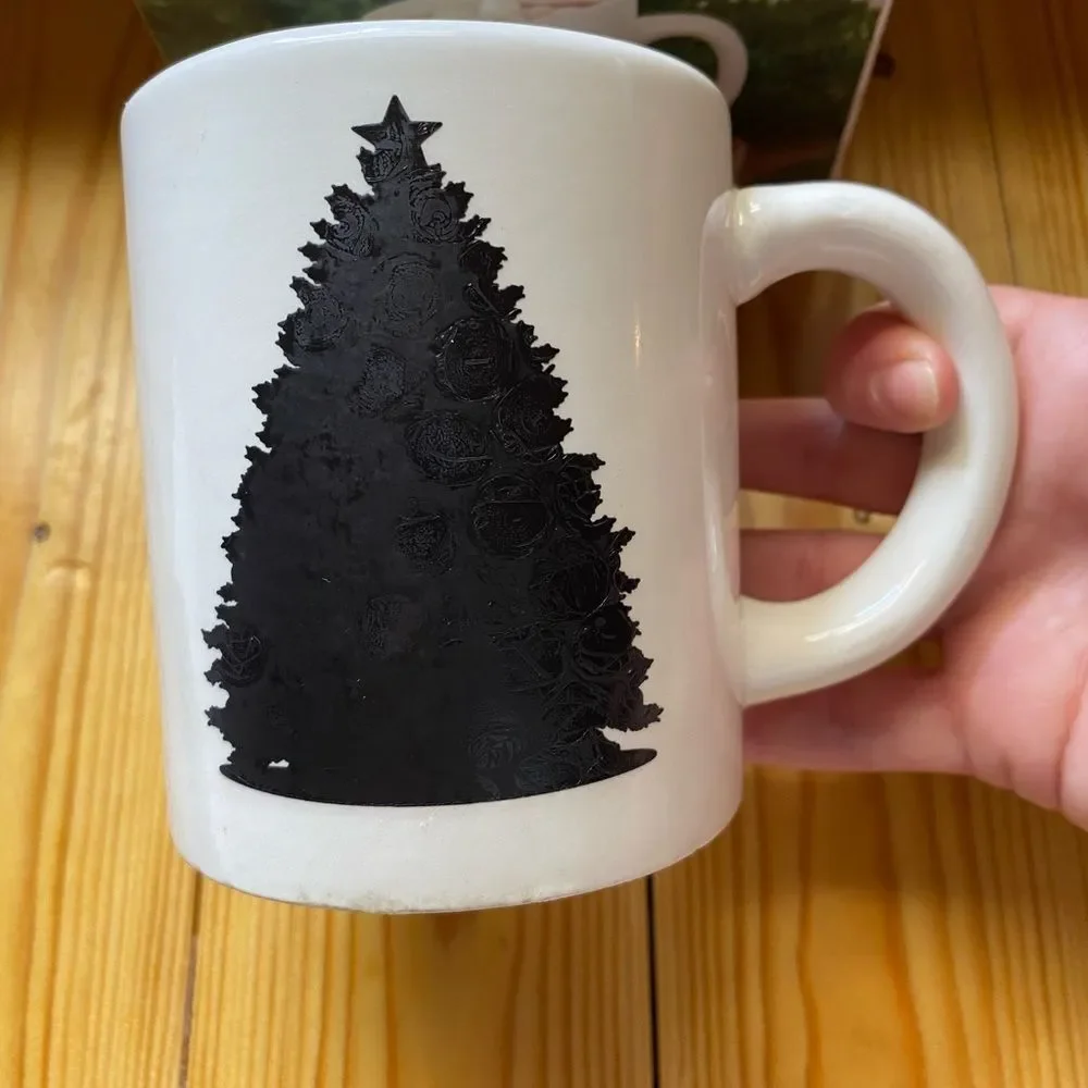 White Ceramic Christmas Tree Mug. Changes colors when filled w/hot liquid.